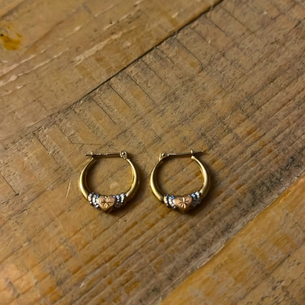 Gold and silver claddagh hoop earrings